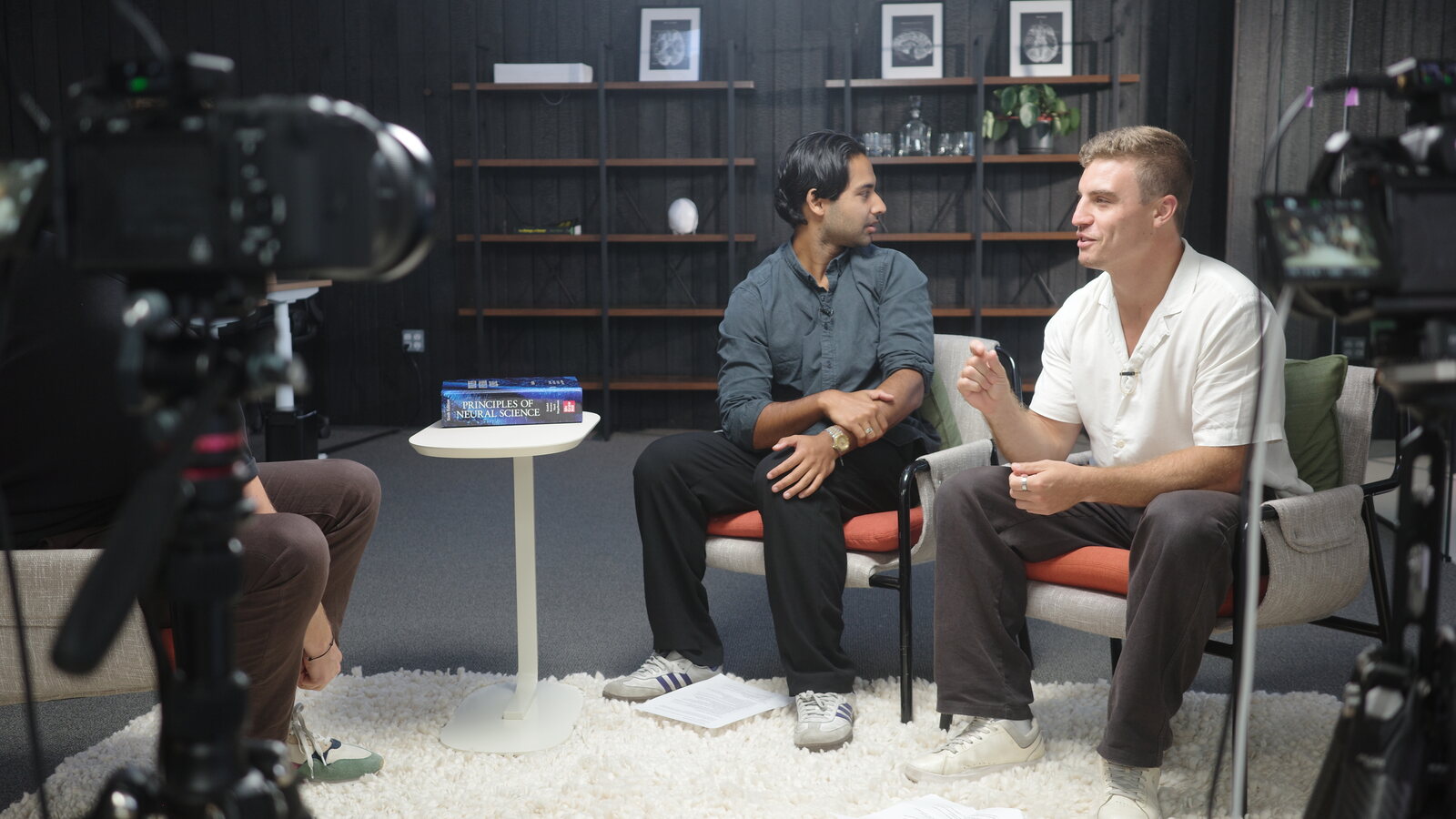 Behind the scenes of The Sachin & Adam Show in production, a multicam interview on the studio monitor